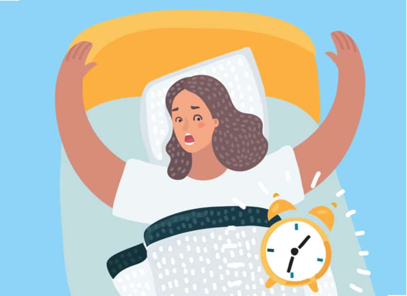woman-waking-up-alarm-clock