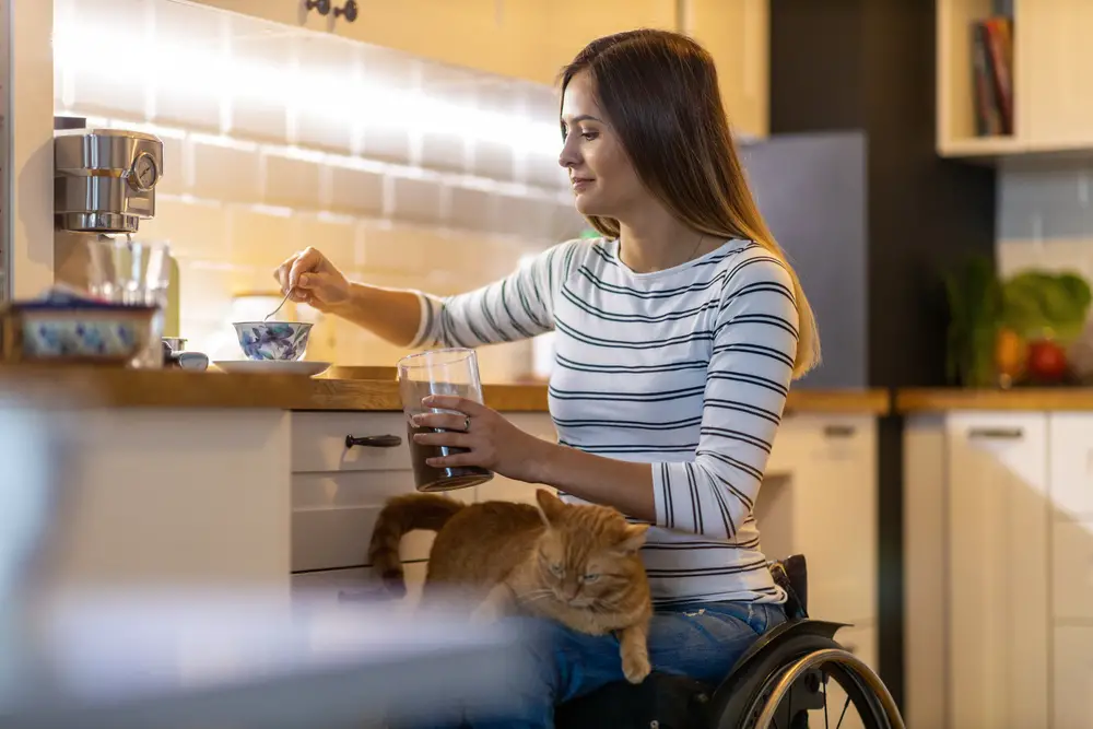woman in wheelchair making easy meal for chronic illness 